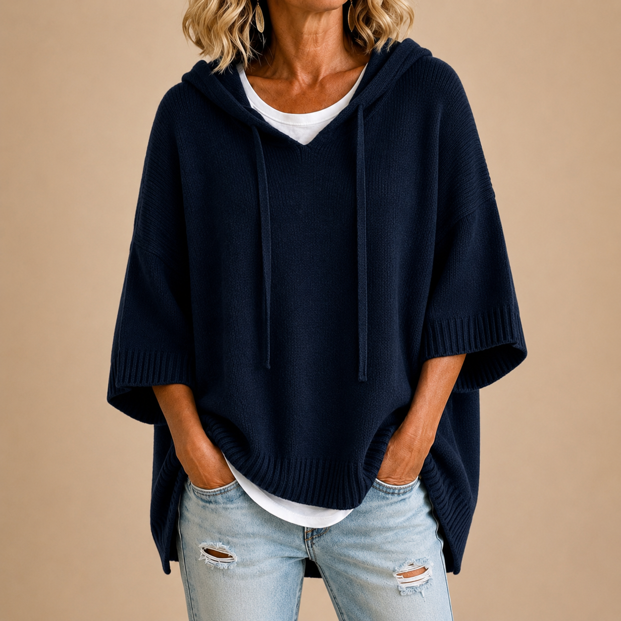 The Emma knit poncho with hood, in navy blue